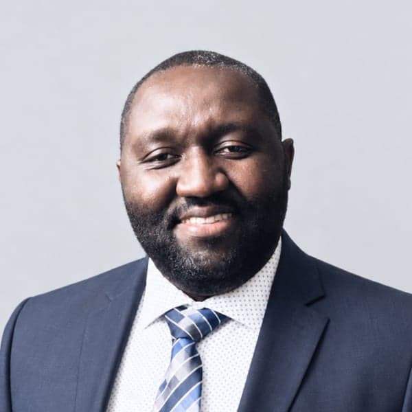 Dr. Bright Borkorm, Secretary & Board Member